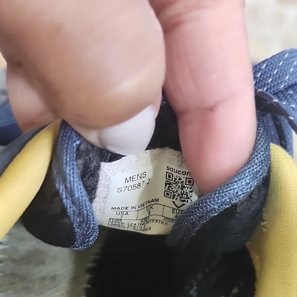 Saucony Blue and Yellow Sneakers Small stains of ink on both tennis in front